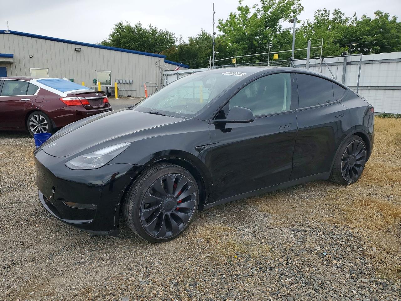 2023 Tesla Model Y Performance, VIN 7SAYGDEF7PF712412 — Prior damage history