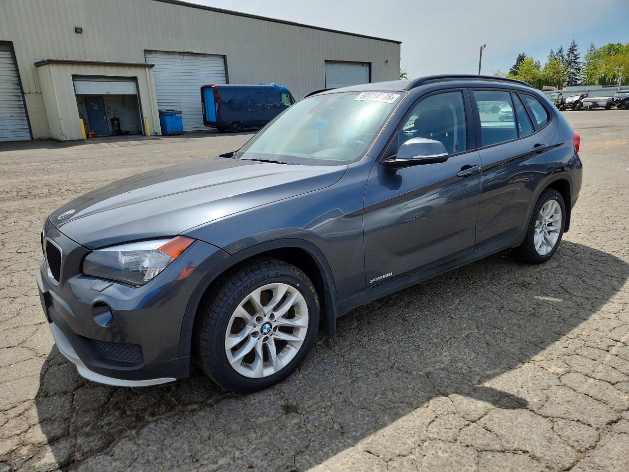 2015 BMW X1 xDrive28i, VIN WBAVL1C50FVY37186 — Rear end