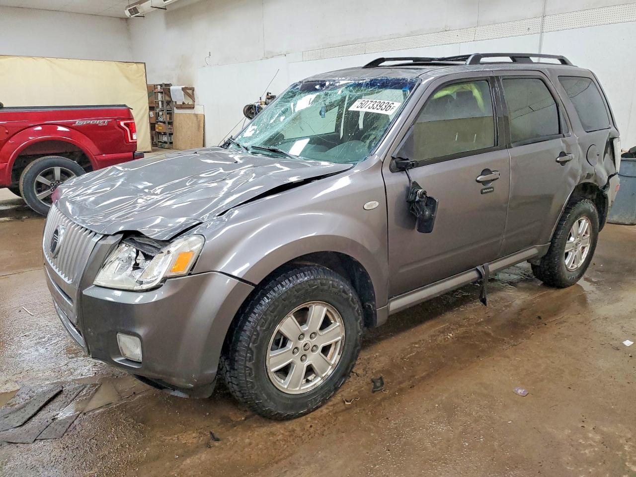 2009 Mercury Mariner, VIN 4M2CU91G99KJ14186 — Rollover