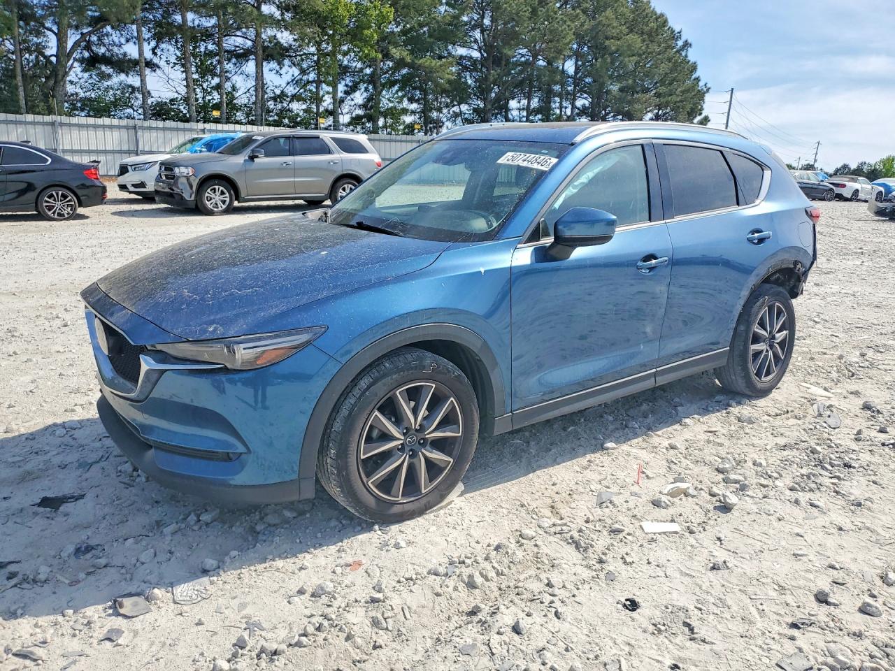 2018 Mazda CX-5 Grand Touring, VIN JM3KFADM1J1445831 — Rear end