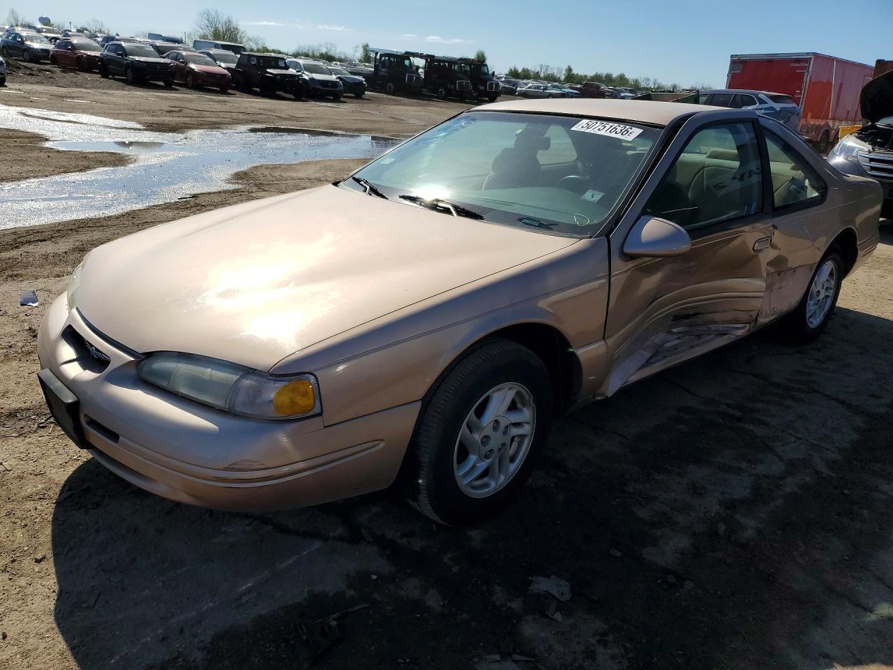 1996 Ford Thunderbird LX, VIN 1FALP624XTH159504 — Side