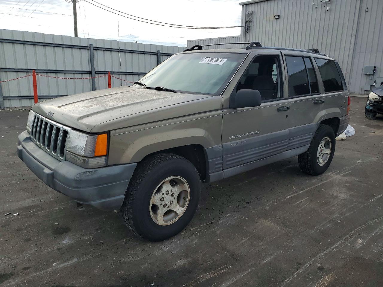 1997 Jeep Grand Cherokee Laredo, VIN 1J4GZ58S7VC564865 — Side