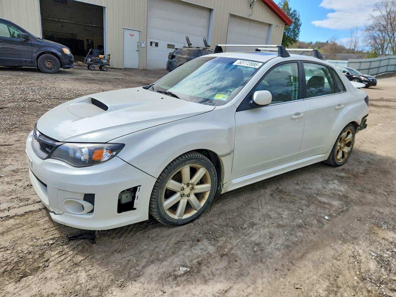 2011 Subaru WRX WRX Limited, VIN JF1GV7F67BG524881 — Зад