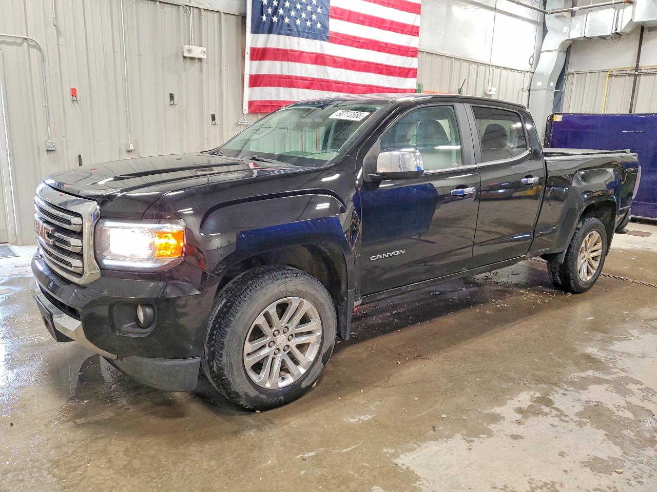2015 GMC Canyon 4WD SLT, VIN 1GTG6CE39F1201433 — Rear end