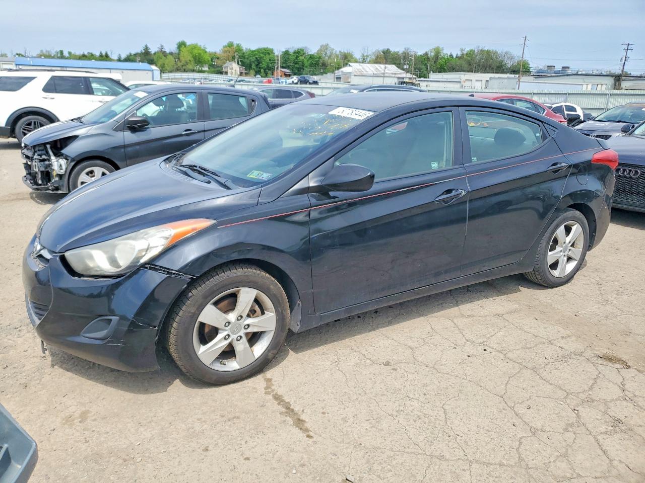 2011 Hyundai Elantra GLS, VIN KMHDH4AE4BU134674 — Vandalism