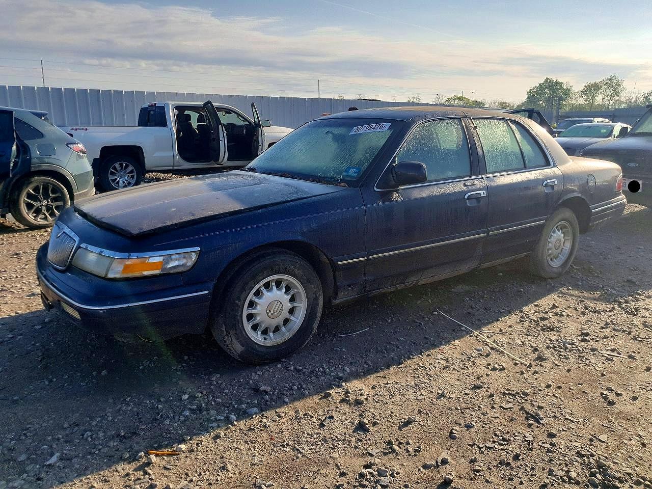 1997 Mercury Grand Marquis LS, VIN 2MELM75W4VX663585 — Hail