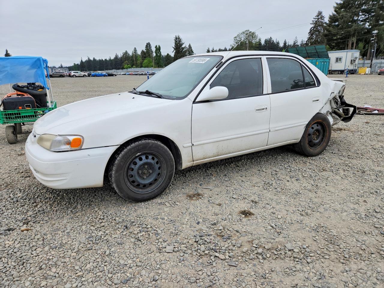 2000 Toyota Corolla CE, VIN 1NXBR12E1YZ364294 — Rear end