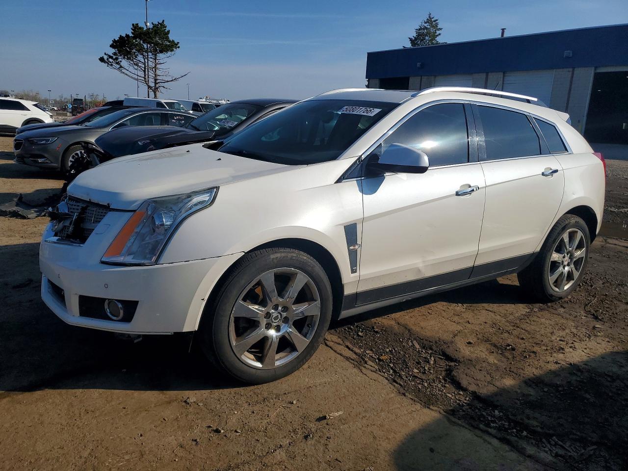 2011 Cadillac SRX Turbo Premium Collection, VIN 3GYFNKE65BS569372 — Front end
