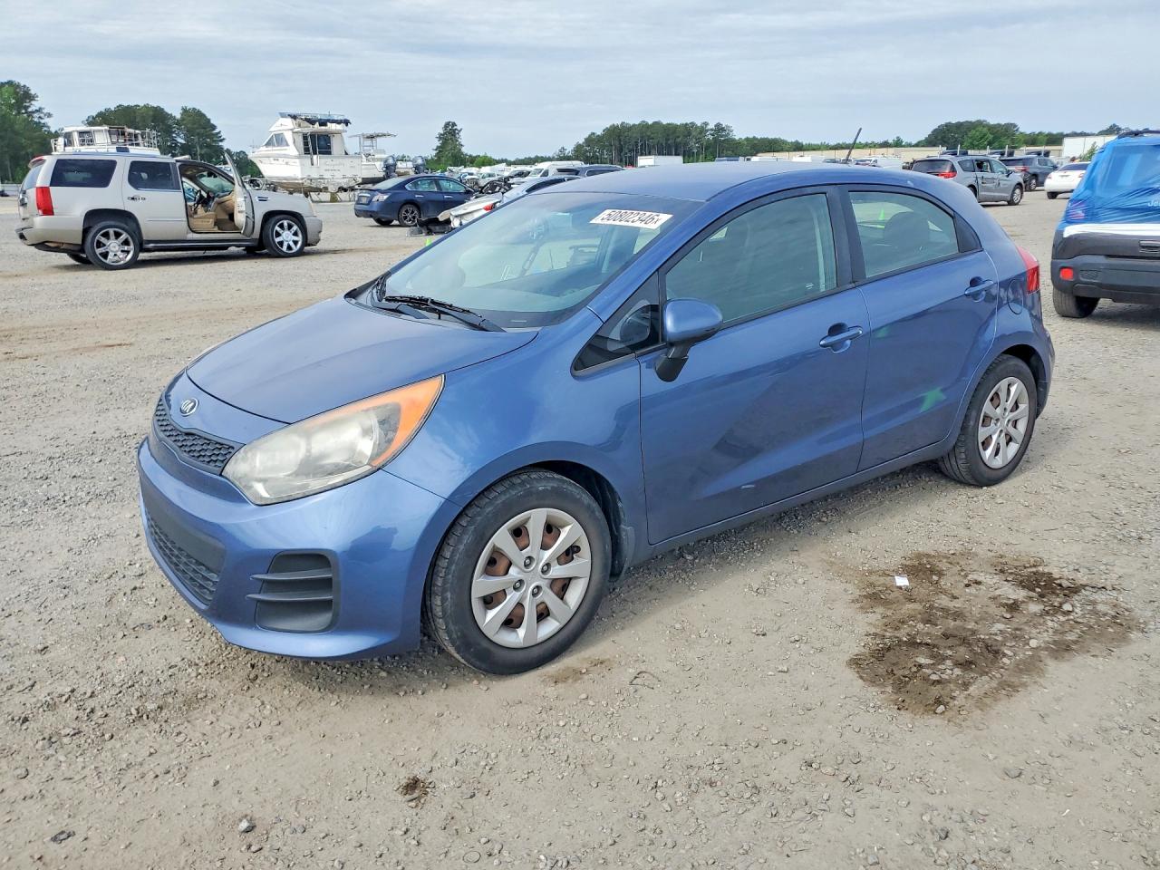 2016 Kia Rio LX, VIN KNADM5A38G6569596 — Side