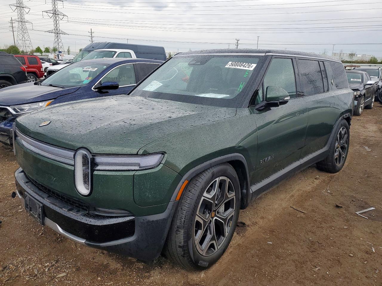 2025 Rivian R1S Adventure, VIN 7PDSGBBA6SN057582 — Зад