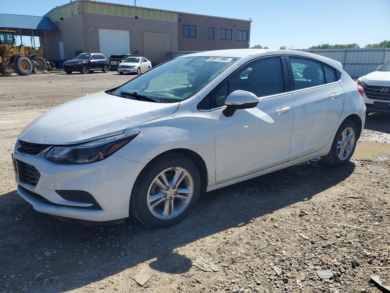 2018 Chevrolet Cruze LT, VIN 3G1BE6SM5JS603803 — Hail