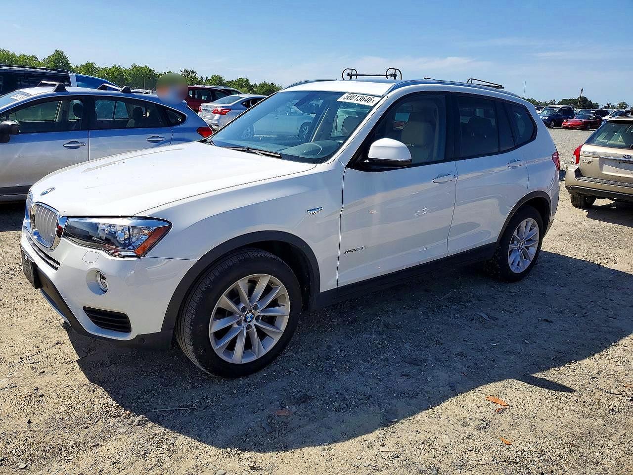 2017 BMW X3 xDrive28i, VIN 5UXWX9C38H0T20225 — Side
