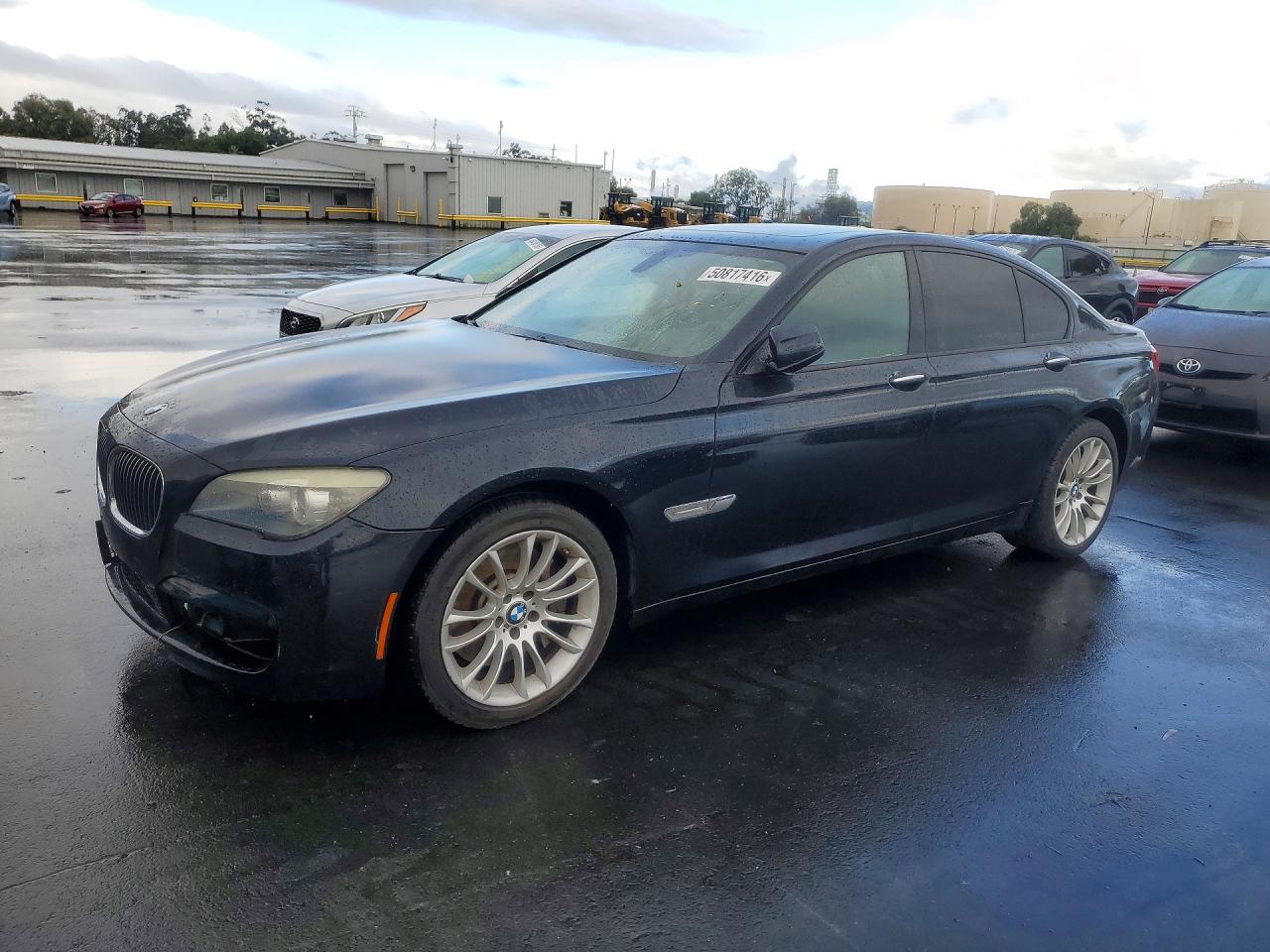 2011 BMW 7 Series 750i, VIN WBAKA8C5XBCY36599 — Minor dents and scratches