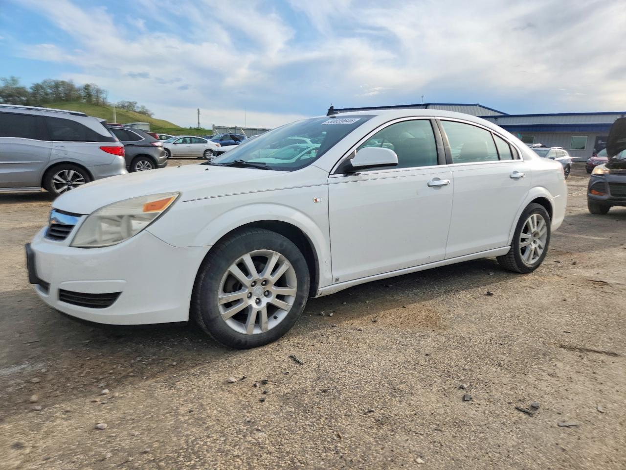 2009 Saturn Aura XR, VIN 1G8ZV57B19F114168 — Hail
