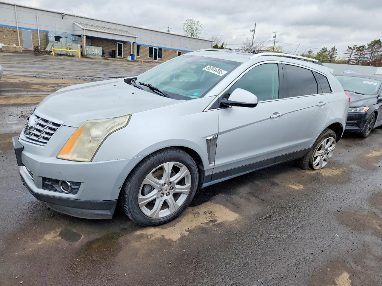 2015 Cadillac SRX Performance Collection, VIN 3GYFNFE30FS595770 — Side