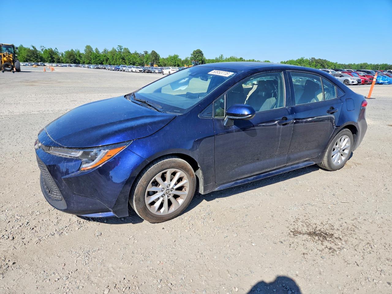 2022 Toyota Corolla LE, VIN JTDHPMAE3NJ207869 — Side