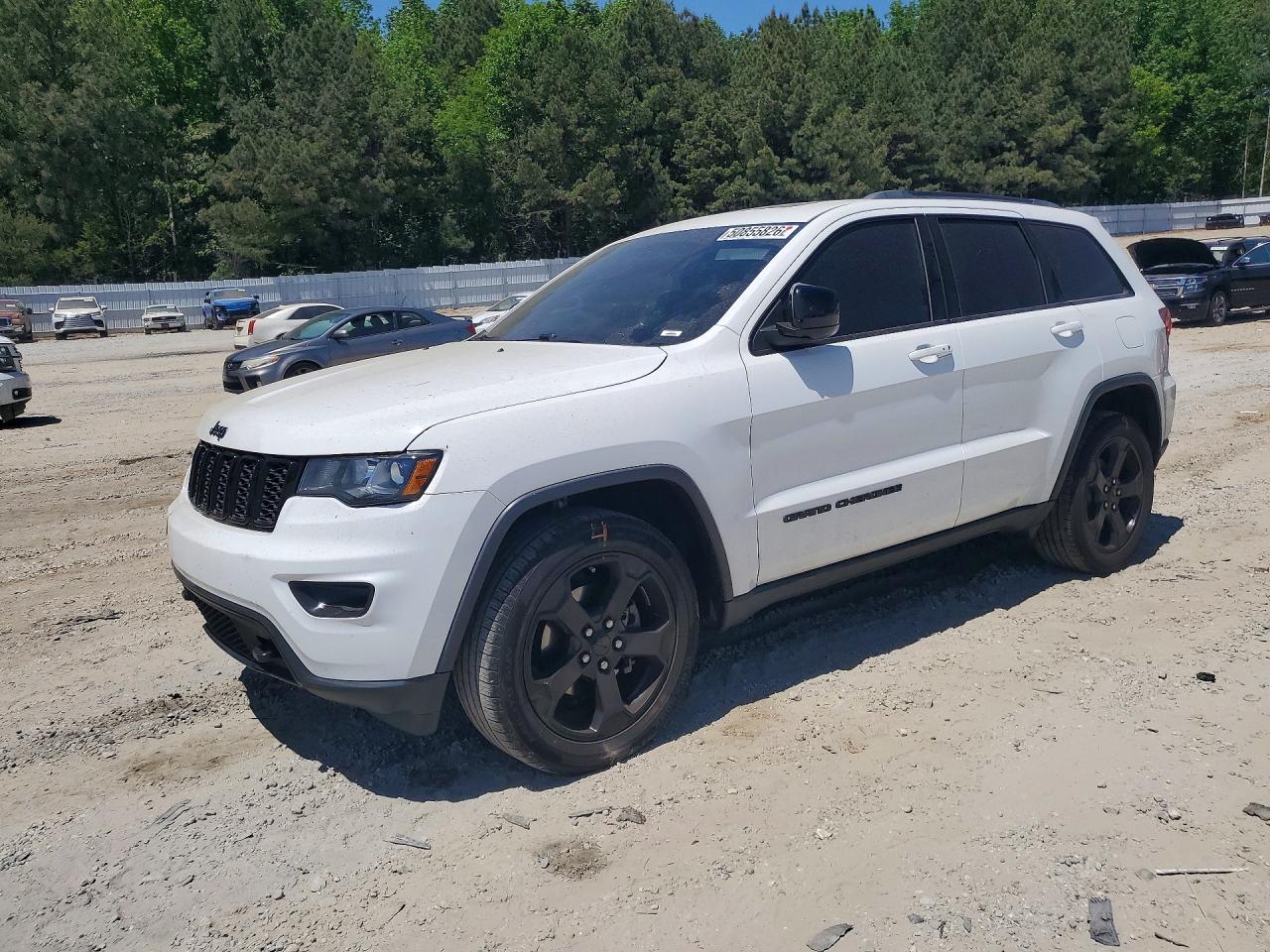 2019 Jeep Grand Cherokee Altitude, VIN 1C4RJEAGXKC597155 — Side