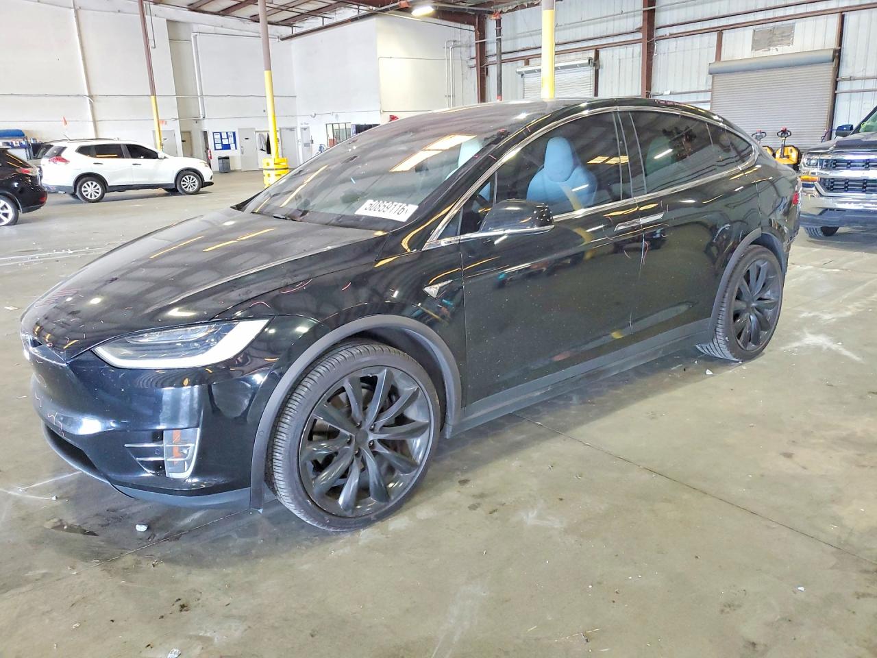 2019 Tesla Model X 75D, VIN 5YJXCBE23KF160843 — Rear end