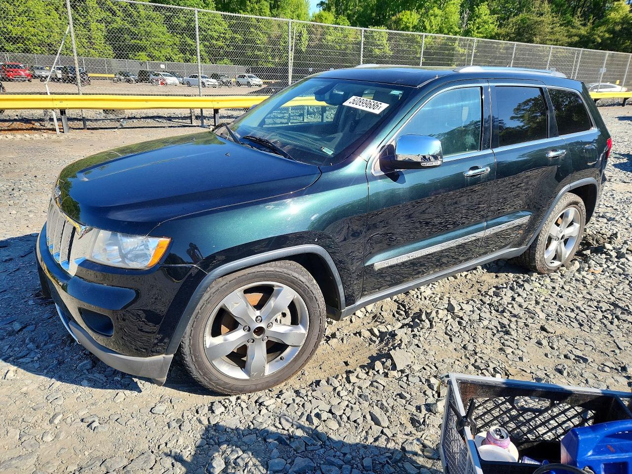 2013 Jeep Grand Cherokee Overland, VIN 1C4RJFCT9DC635610 — Minor dents and scratches