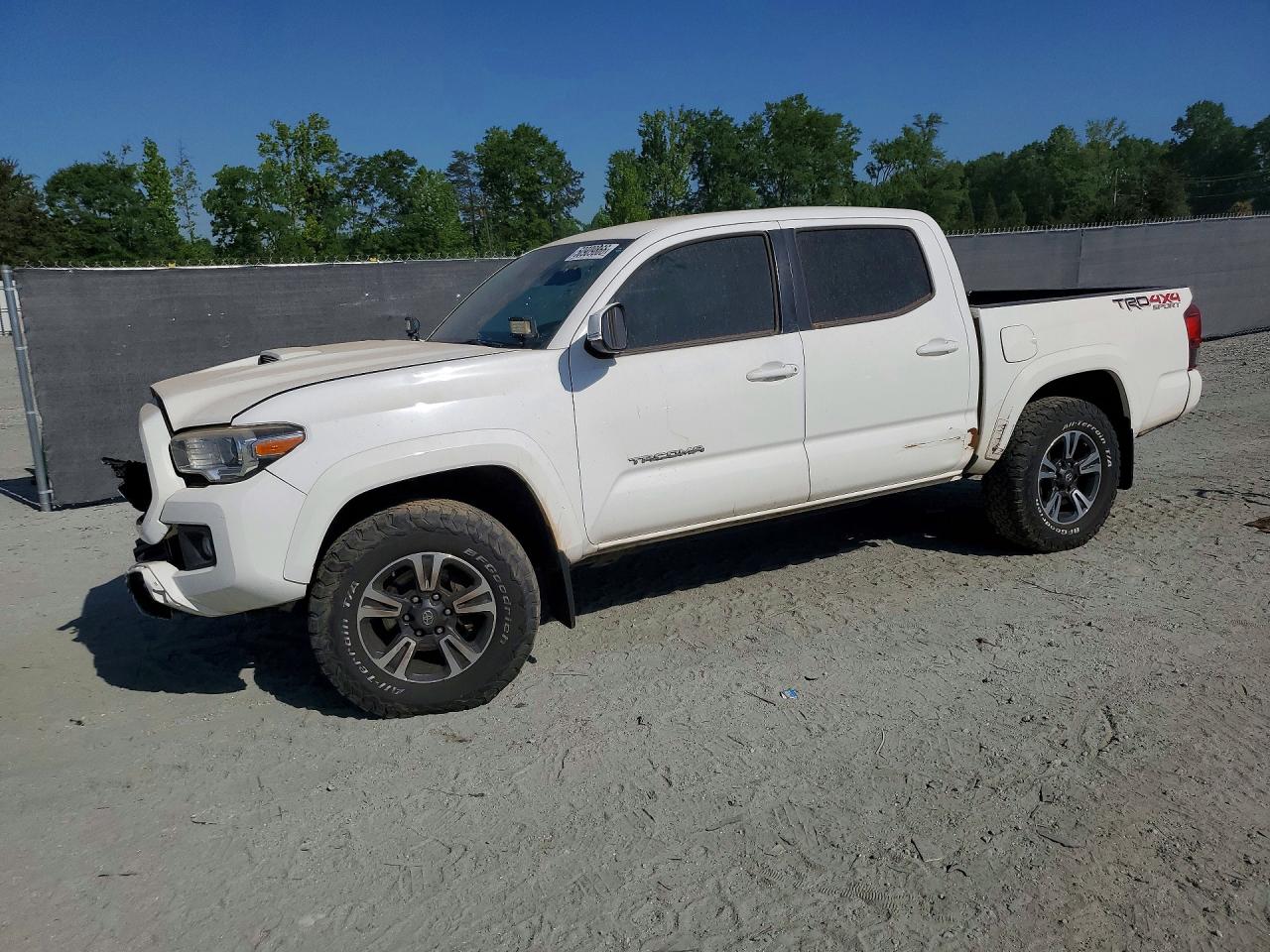 2019 Toyota Tacoma TRD Sport, VIN 3TMCZ5AN4KM221675 — Front end