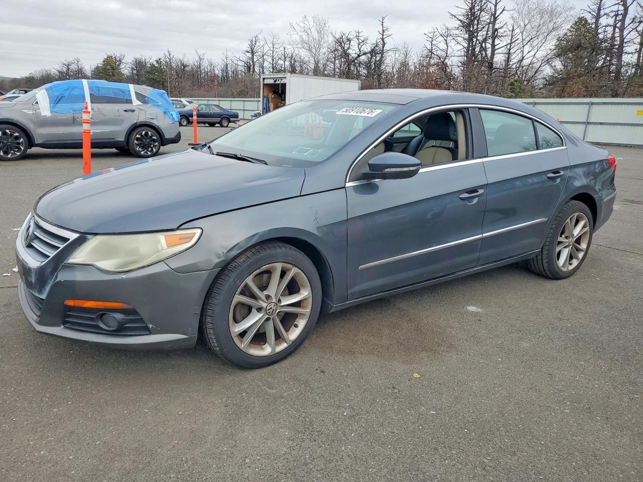 2009 Volkswagen CC Luxury, VIN WVWHL73C29E546291 — Side