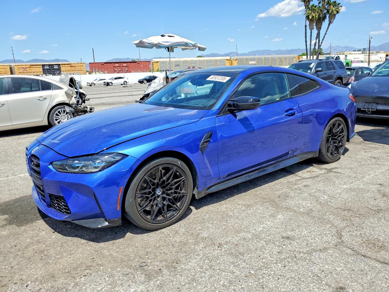 2023 BMW M4 Competition, VIN WBS33AZ09PCM18474 — Rear end