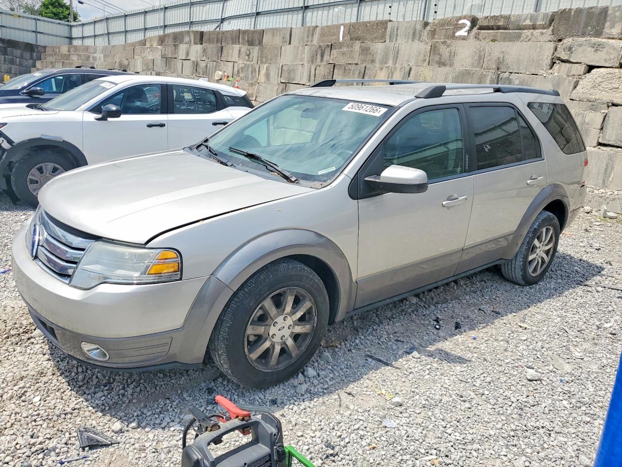 2008 Ford Taurus X SEL, VIN 1FMDK02W28GA07060 — Rear end