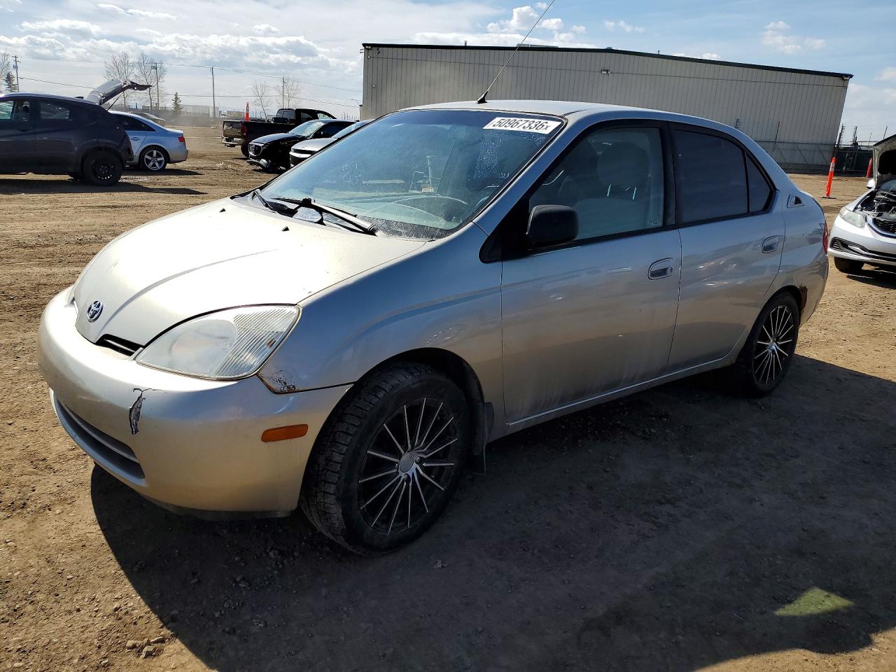 2001 Toyota Prius, VIN JT2BK12U910021433 — Side