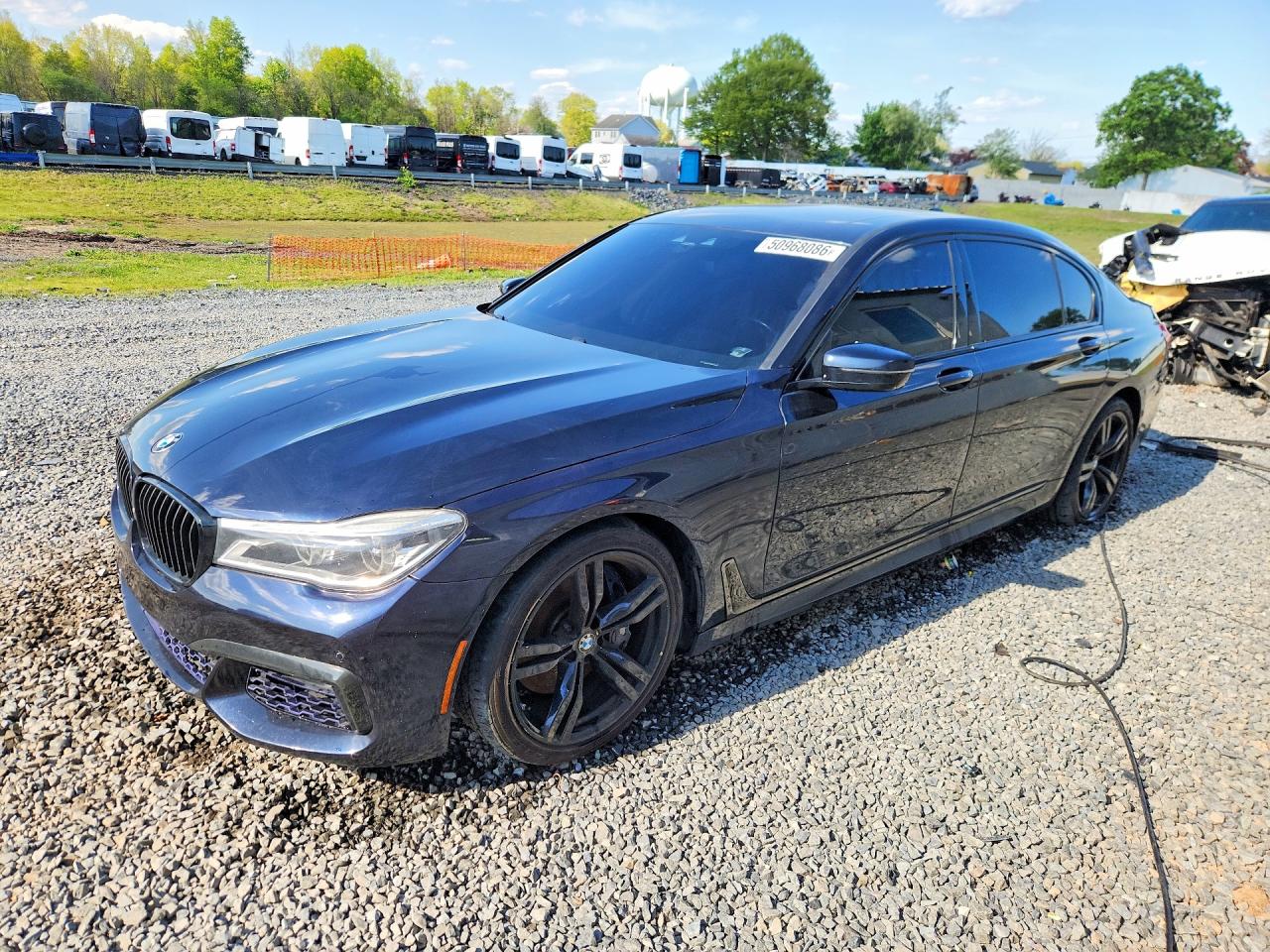 2016 BMW 7 Series 750i xDrive, VIN WBA7F2C58GG415971 — Side