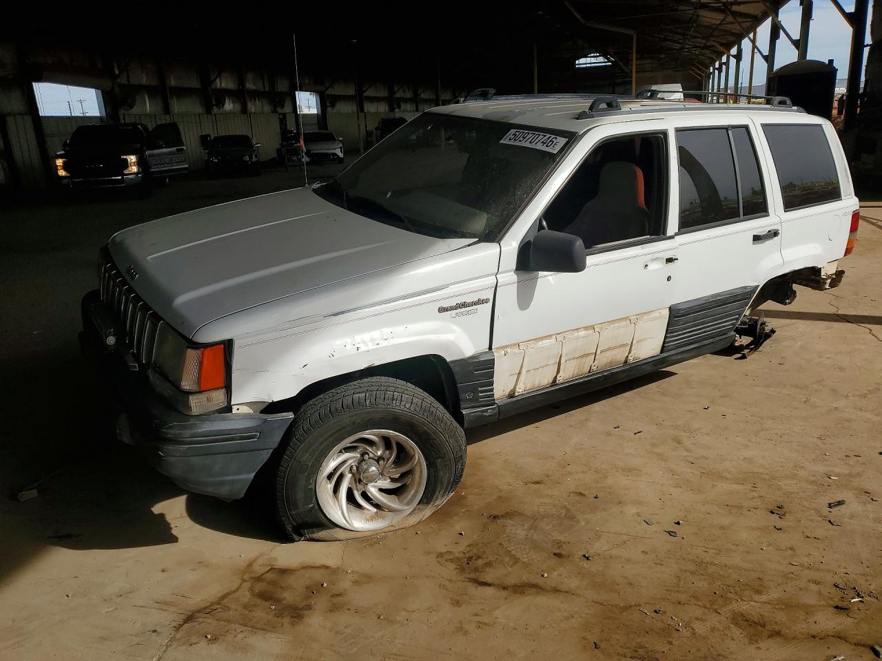 1995 Jeep Grand Cherokee Laredo, VIN 1J4GZ58S6SC517340 — Rear end