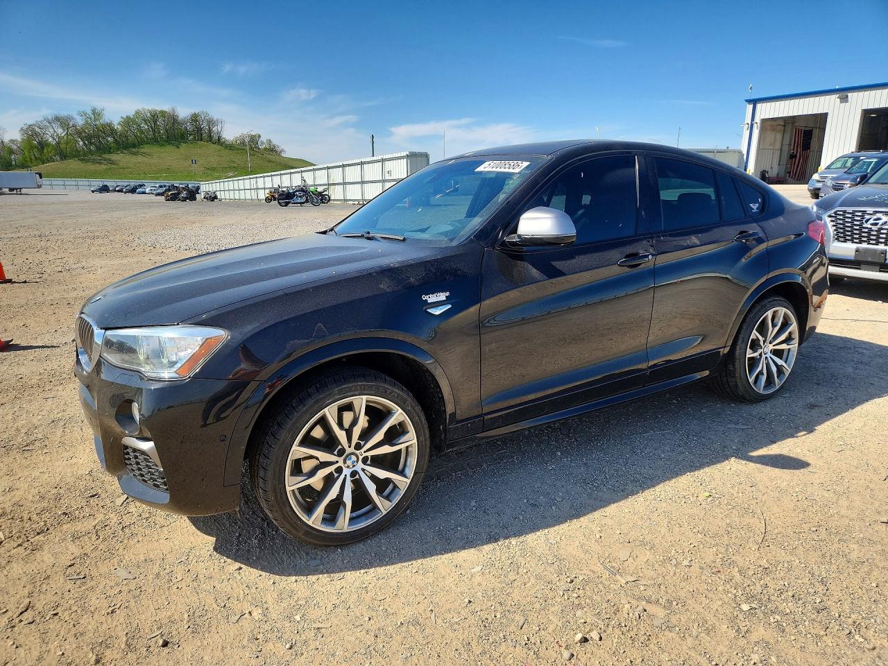 2017 BMW X4 M40i, VIN 5UXXW7C37H0U26628 — Hail