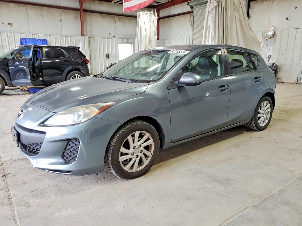 2012 Mazda 3 i Grand Touring, VIN JM1BL1M76C1664279 — Rear end