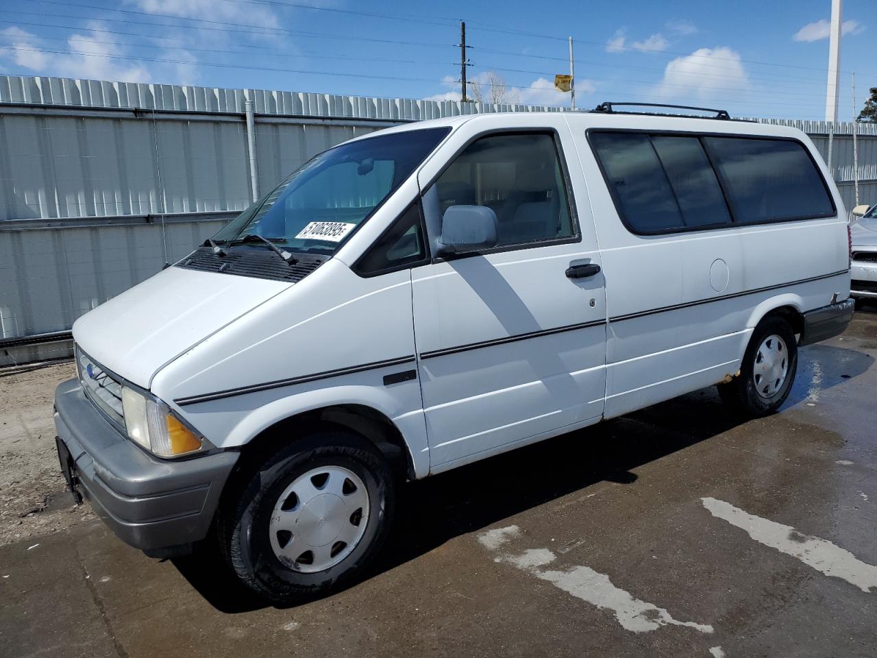 1997 Ford Aerostar XLT, VIN 1FMDA41X6VZA54676 — Side