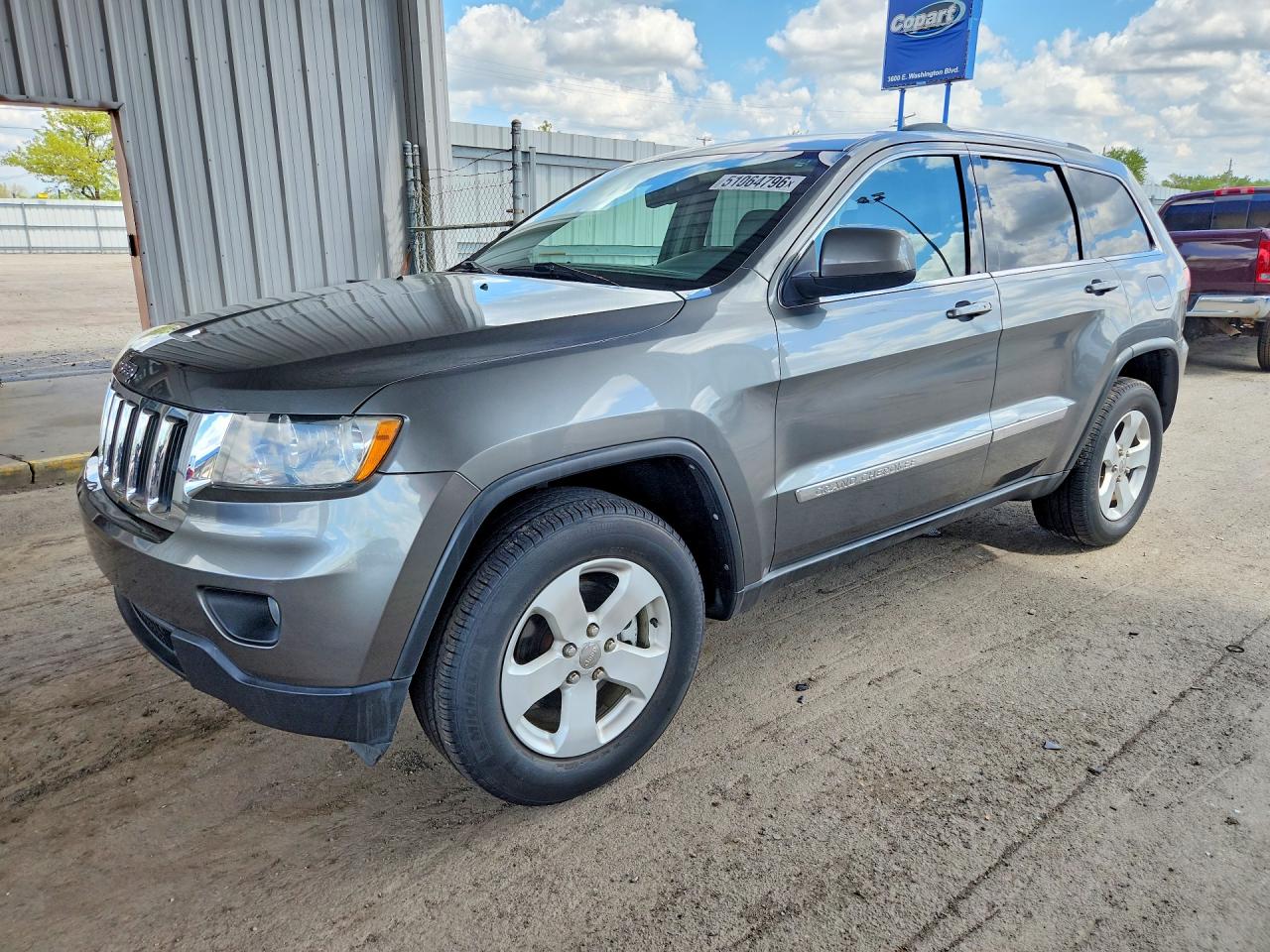2011 Jeep Grand Cherokee Laredo, VIN 1J4RR4GG5BC681260 — Hail