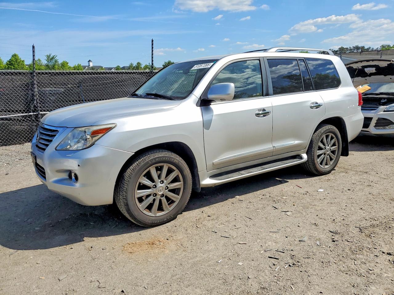 2011 Lexus LX 570, VIN JTJHY7AX9B4082268 — Normal wear