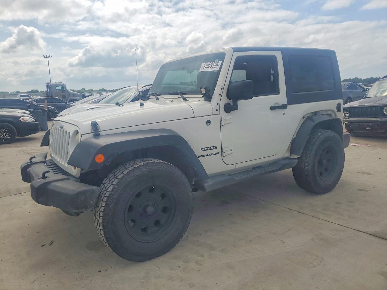 2010 Jeep Wrangler Islander, VIN 1J4AA2D12AL136222 — Rear end