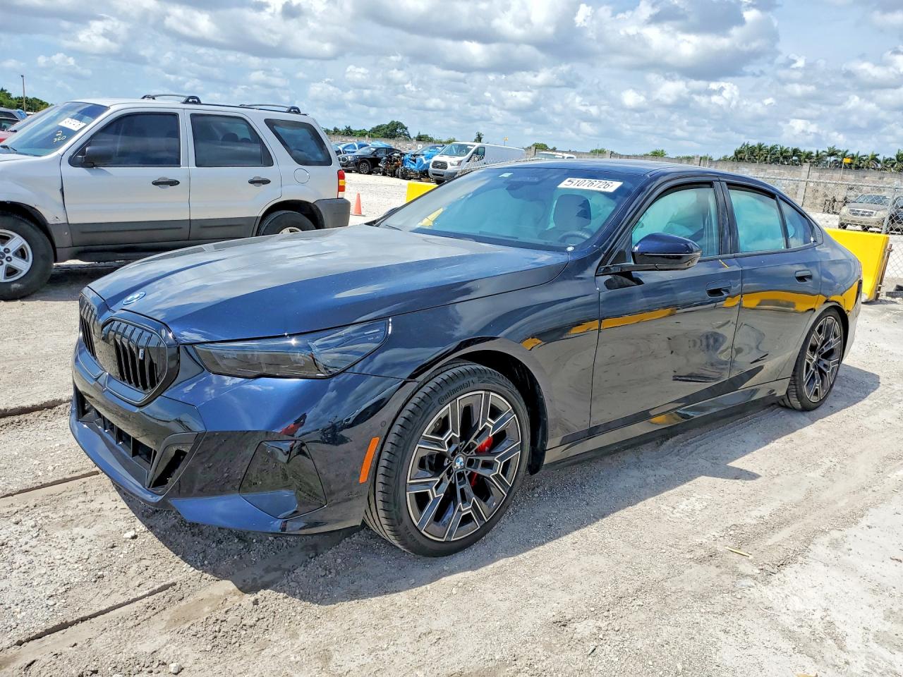 2026 BMW i5 eDrive40, VIN WBY63HG03TCW49945 — Rear end