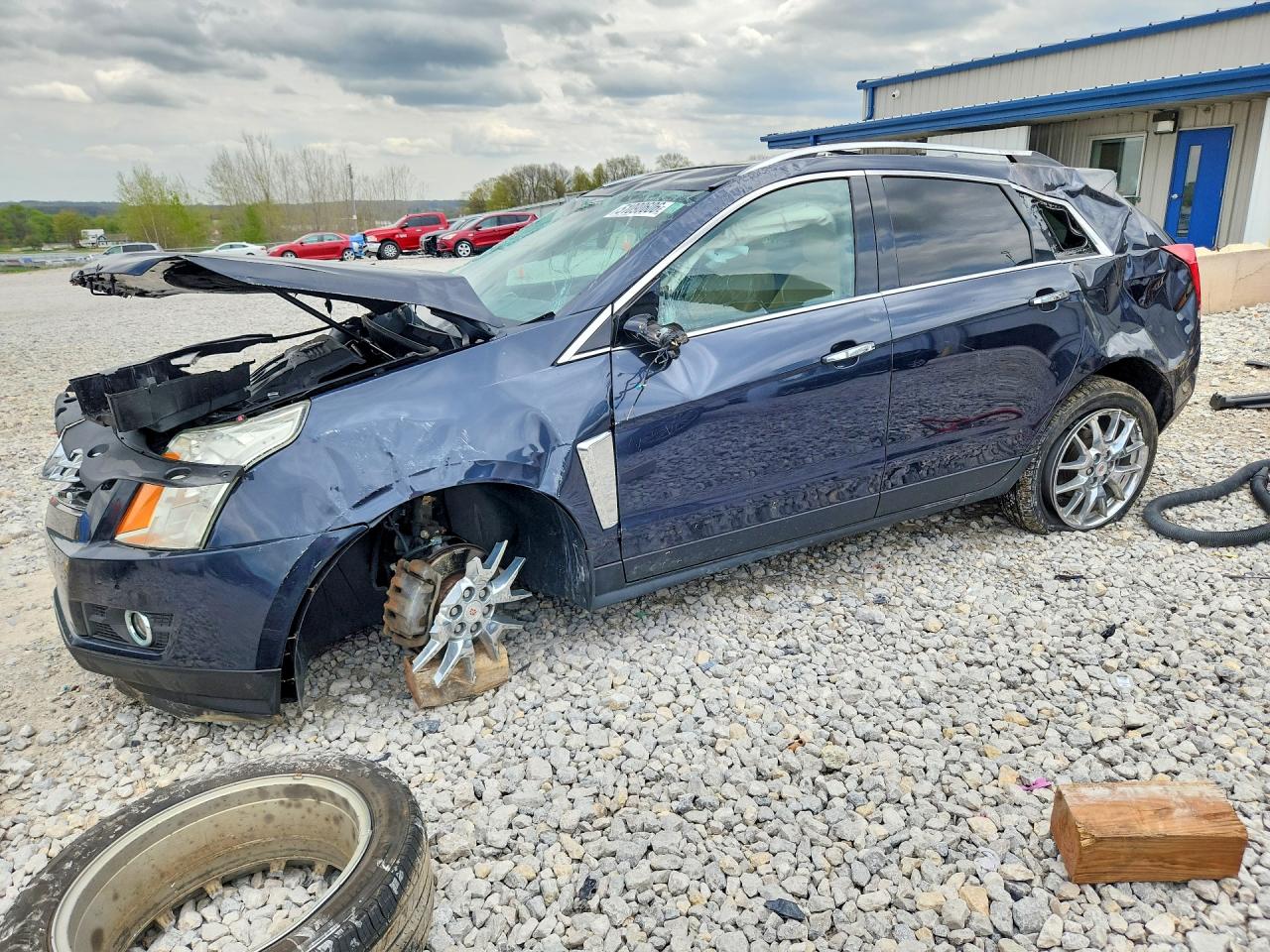 2014 Cadillac SRX Performance Collection, VIN 3GYFNFE31ES583433 — Rollover