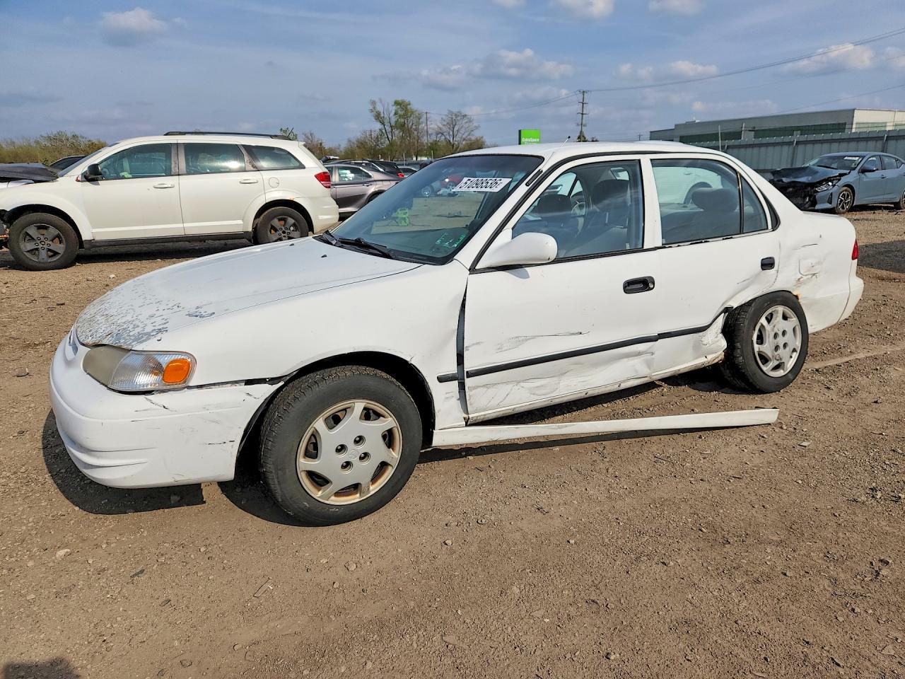 2000 Toyota Corolla LE, VIN 1NXBR18E6YZ315843 — Side