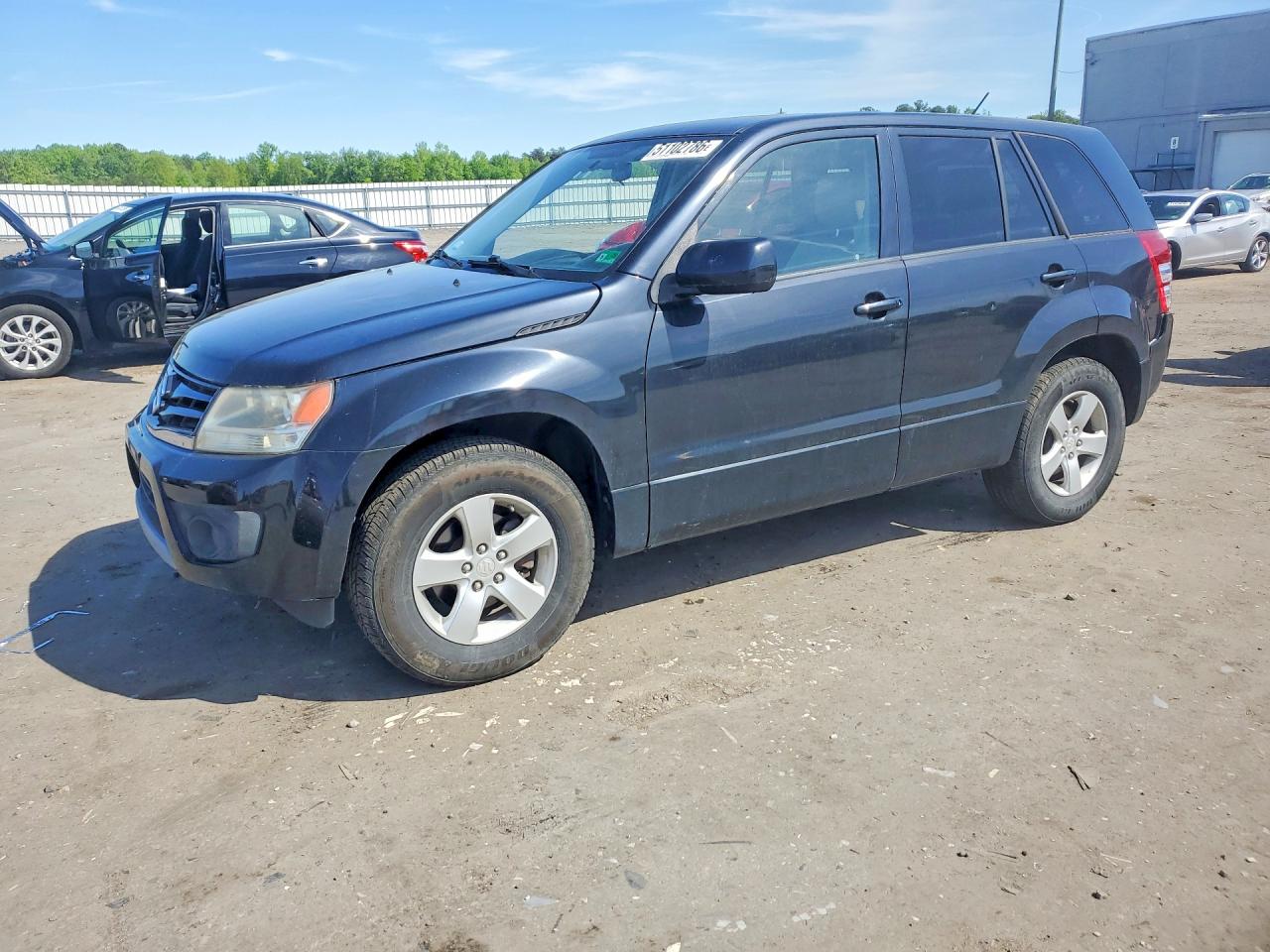2013 Suzuki Grand Vitara Premium, VIN JS3TE0D65D4100057 — Side