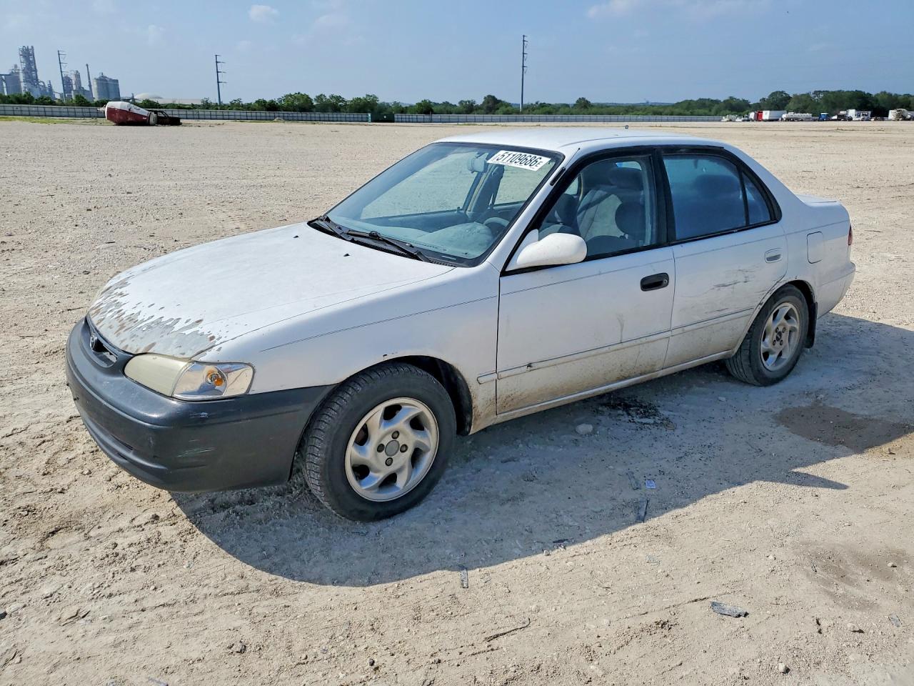 2000 Toyota Corolla CE, VIN 1NXBR12E6YZ325894 — Rear end