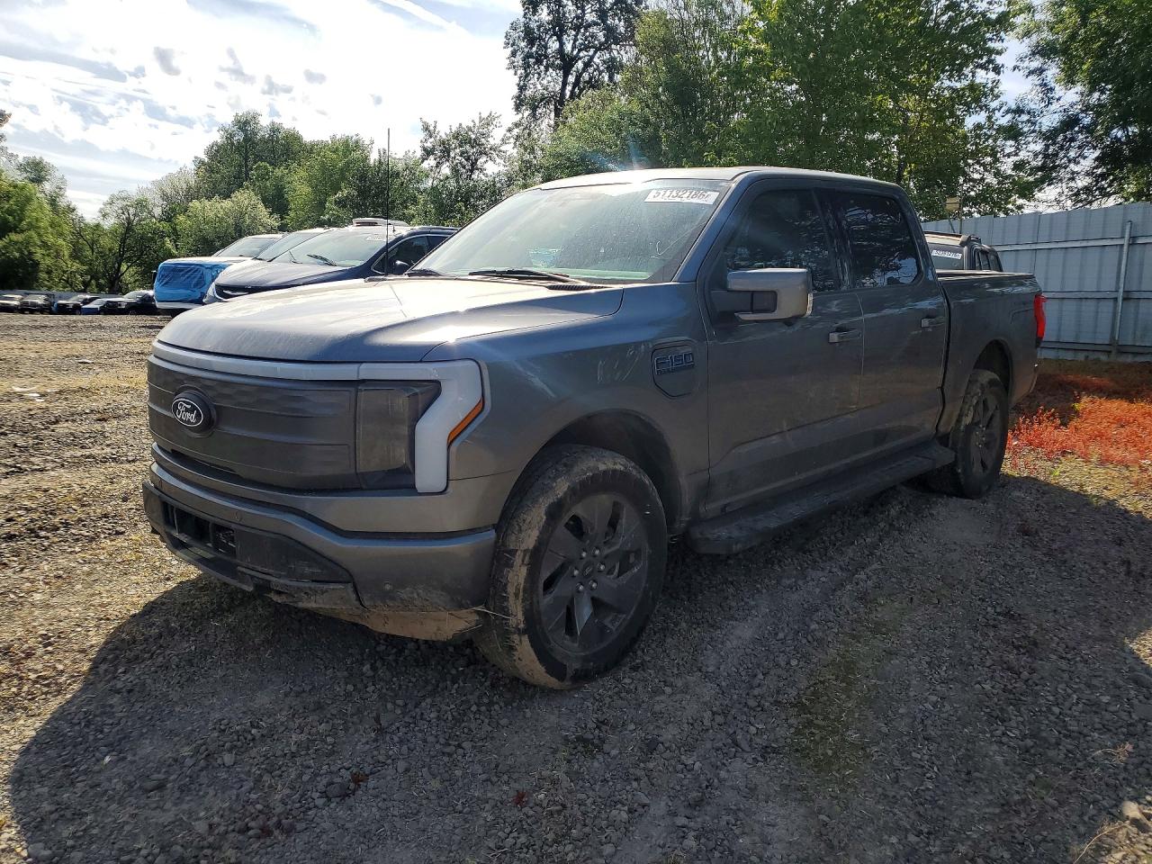2024 Ford F-150 Lightning Lariat, VIN 1FT6W5L74RWG15112 — Front end