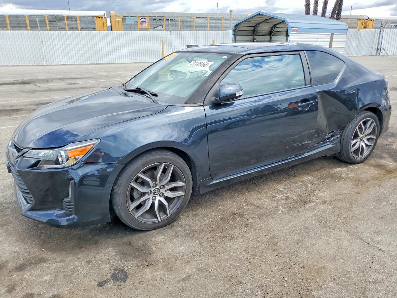 2015 Scion tC, VIN JTKJF5C77FJ008715 — Side