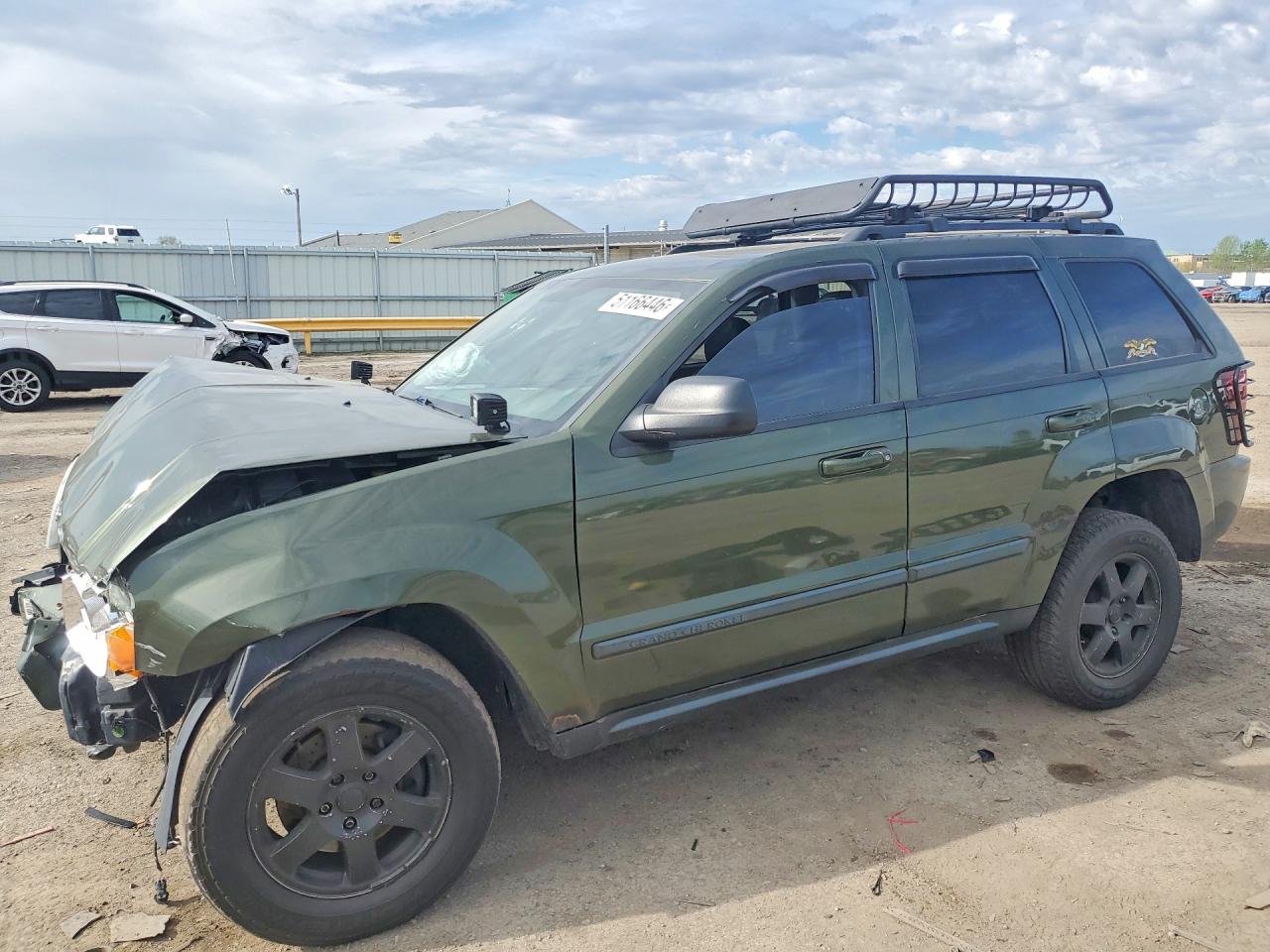 2008 Jeep Grand Cherokee Laredo, VIN 1J8GR48K28C181588 — Front end