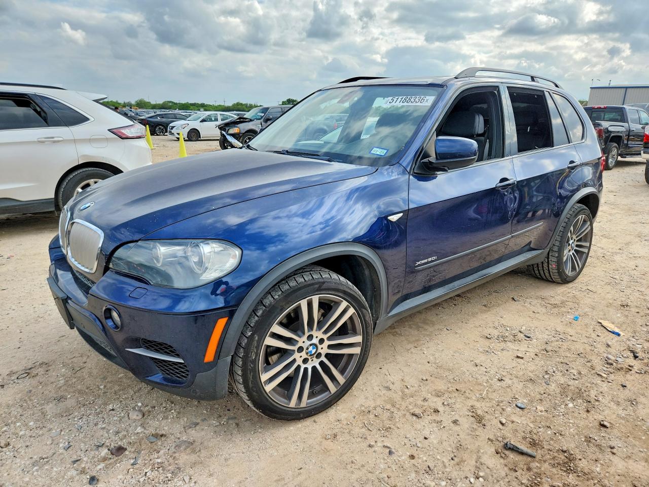 2011 BMW X5 50i, VIN 5UXZV8C5XBLL67955 — Minor dents and scratches