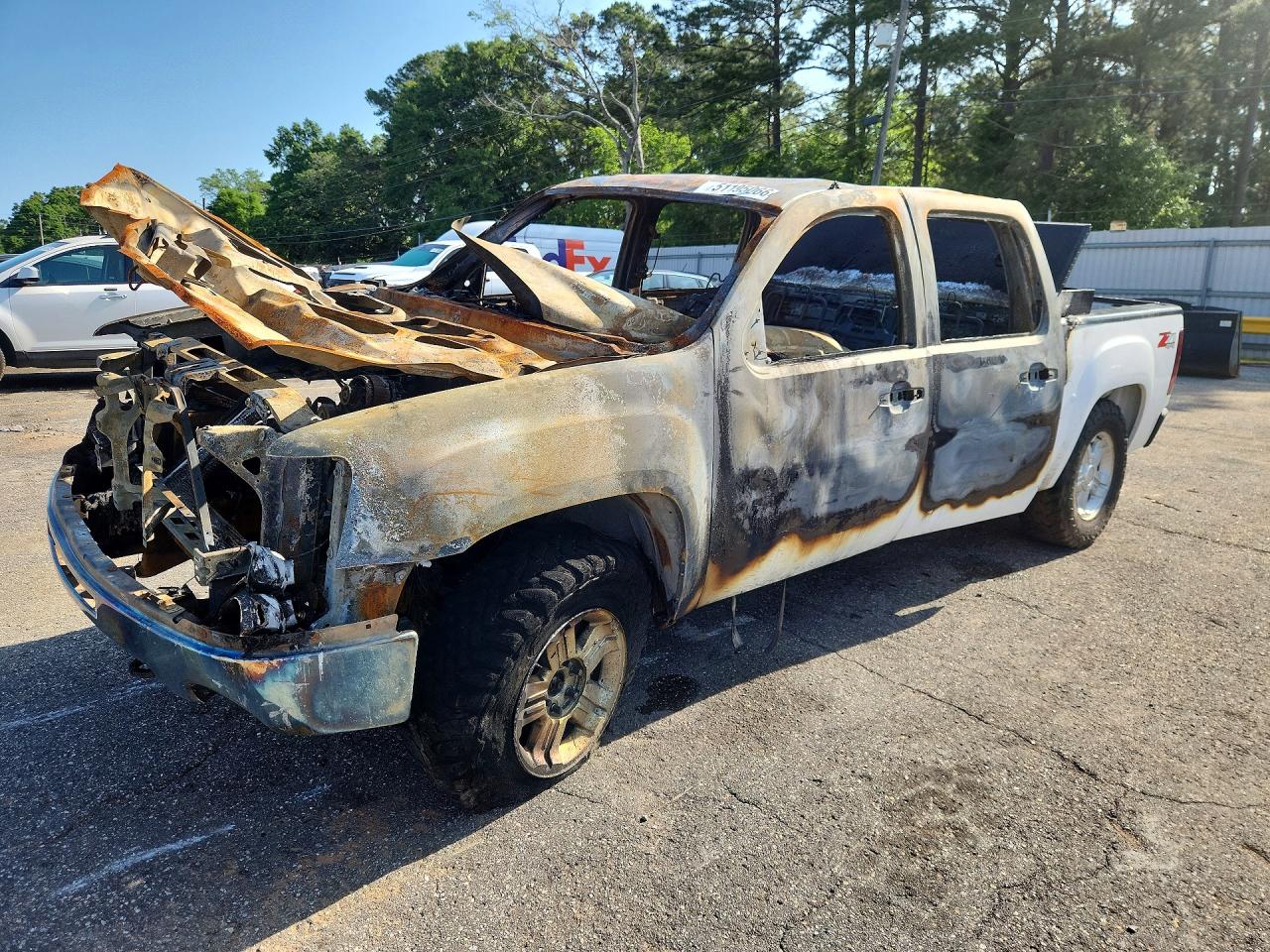 2010 GMC Sierra 1500 SLE, VIN 3GTRKVE30AG277682 — Engine fire
