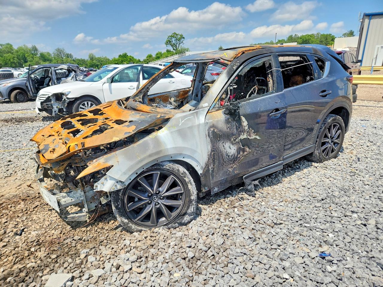 2017 Mazda CX-5 Grand Touring, VIN JM3KFBDL4H0201832 — Burn