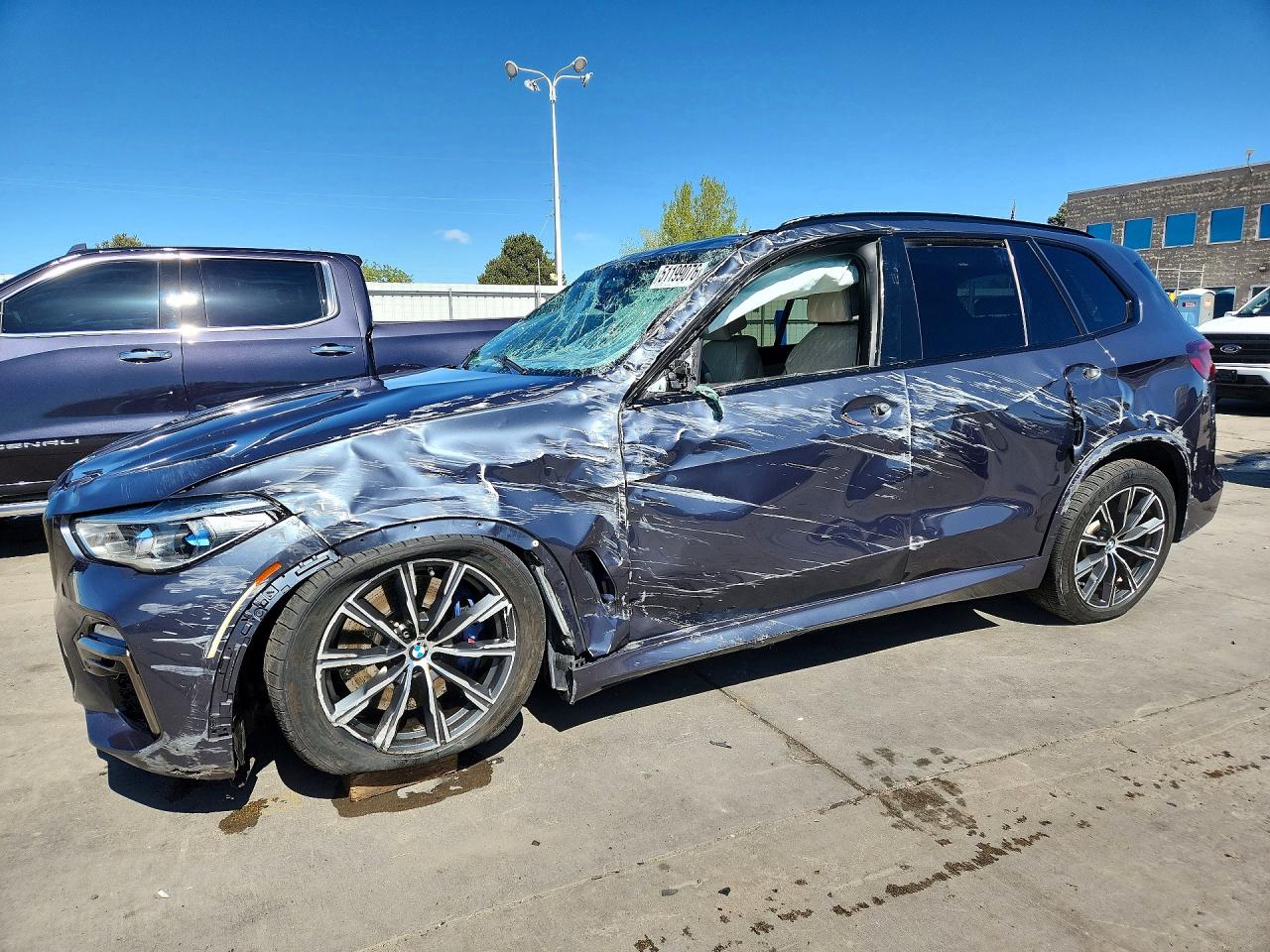 2021 BMW X5 M50i, VIN 5UXJU4C07M9F17469 — Rollover