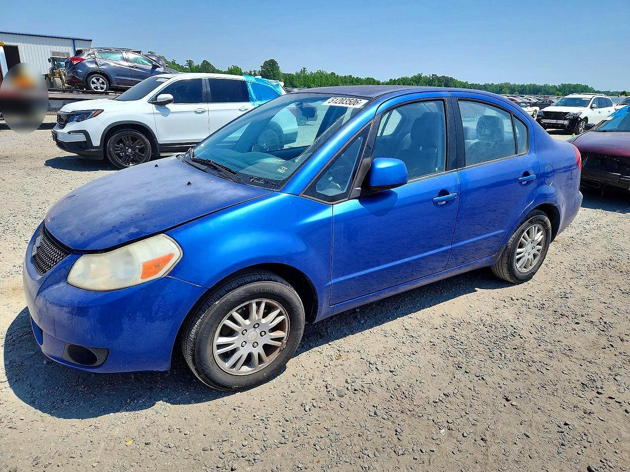 2013 Suzuki SX4 LE, VIN JS2YC5A35D6100359 — Rear end