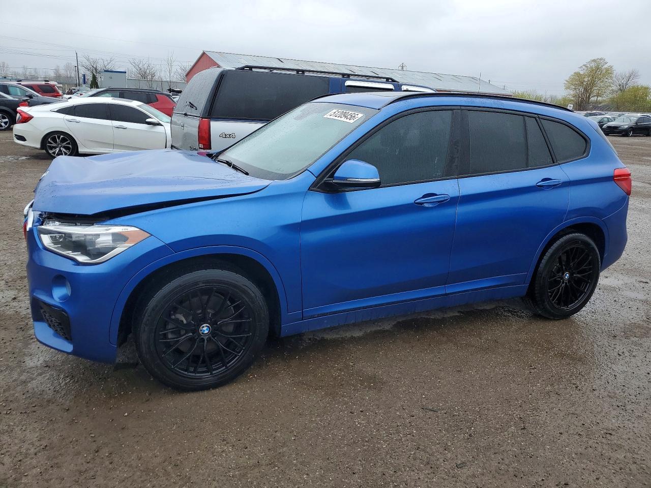 2018 BMW X1 xDrive28i, VIN WBXHT3C38J5L31062 — Front end
